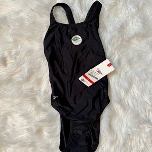 Woman’s Speedo bathing suit.